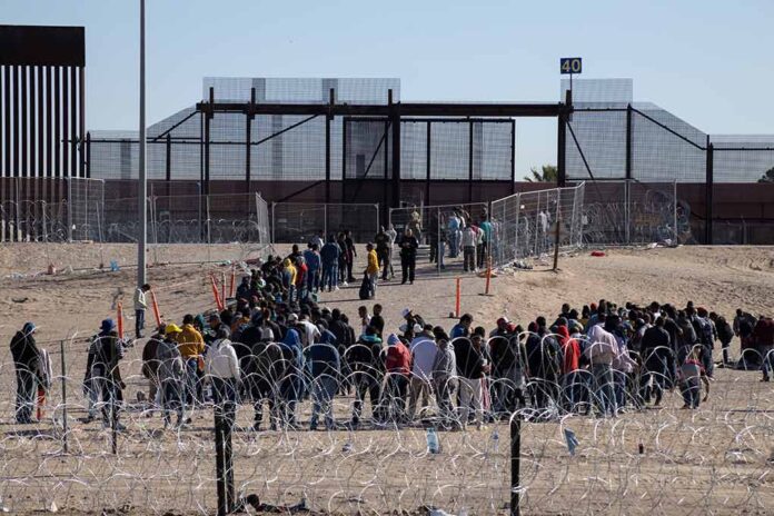 People waiting in line at border gate 40.