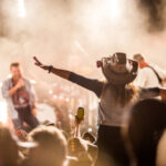 Audience enjoying a live concert with a performer on stage