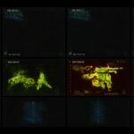 Thermal imaging display showing various military equipment and personnel