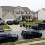 GUNMAN ATTACKS Trump at High-Profile Event FBI agents conducting an operation in a suburban neighborhood