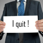 Trump’s TOP AI Architect Walks — Why Now? Person holding a sign that says I quit!.