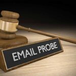 90,000 Staff Hit With God Memo? Judge’s gavel beside a nameplate reading EMAIL PROBE