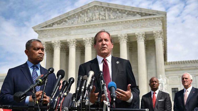 Men in suits speaking at podium outside courthouse.